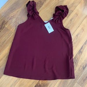 NWT size medium top. Moran color.